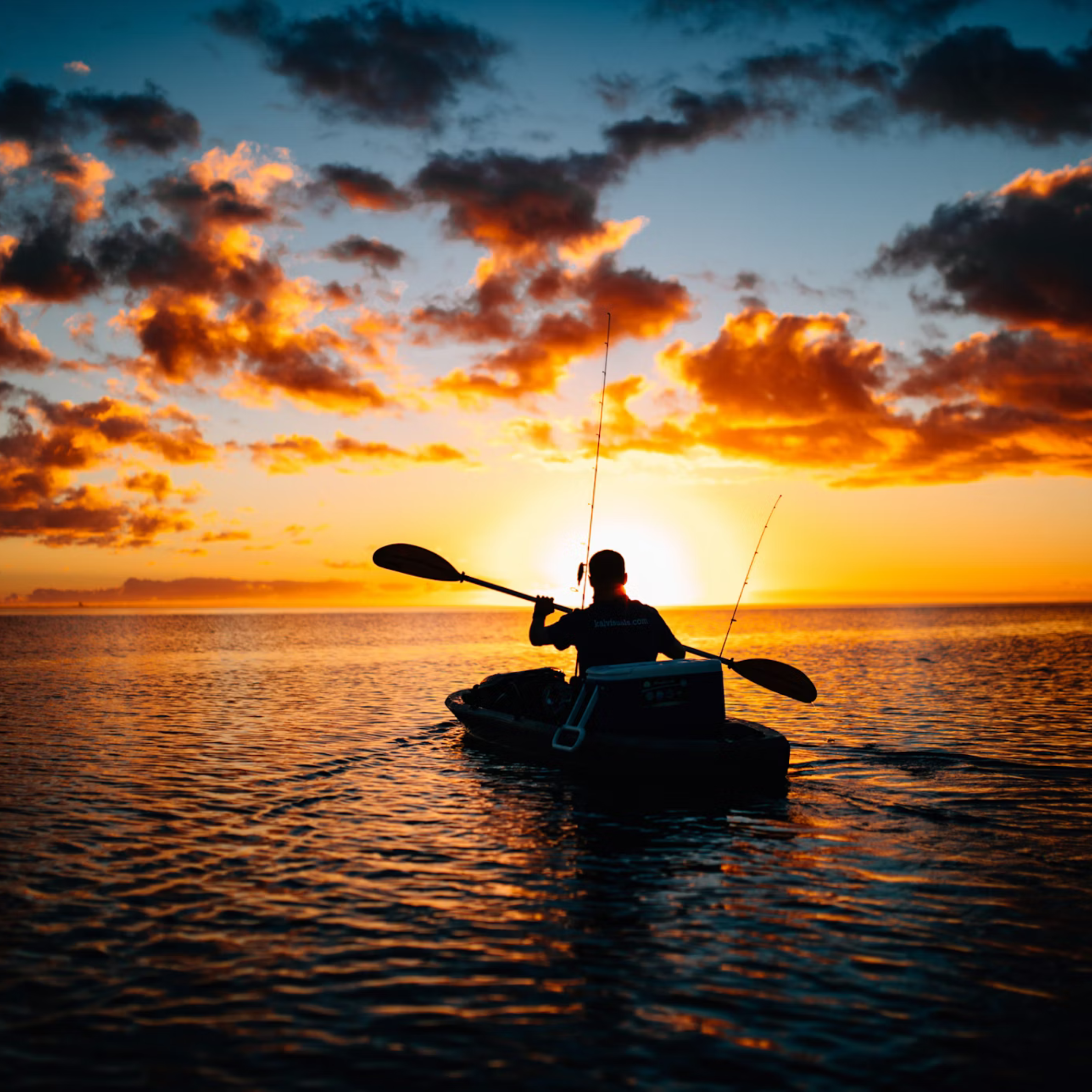 Man kayak fishing wearing Dry Pocket's waterproof pocket apparel 