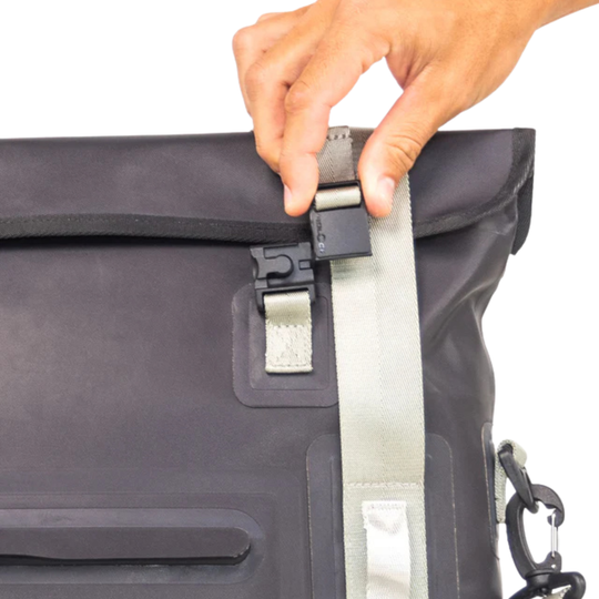 Dry Pocket black magnetic auto-sealing, waterproof, scent proof, and floating 16 can tote cooler that can also act as a dry bag. 