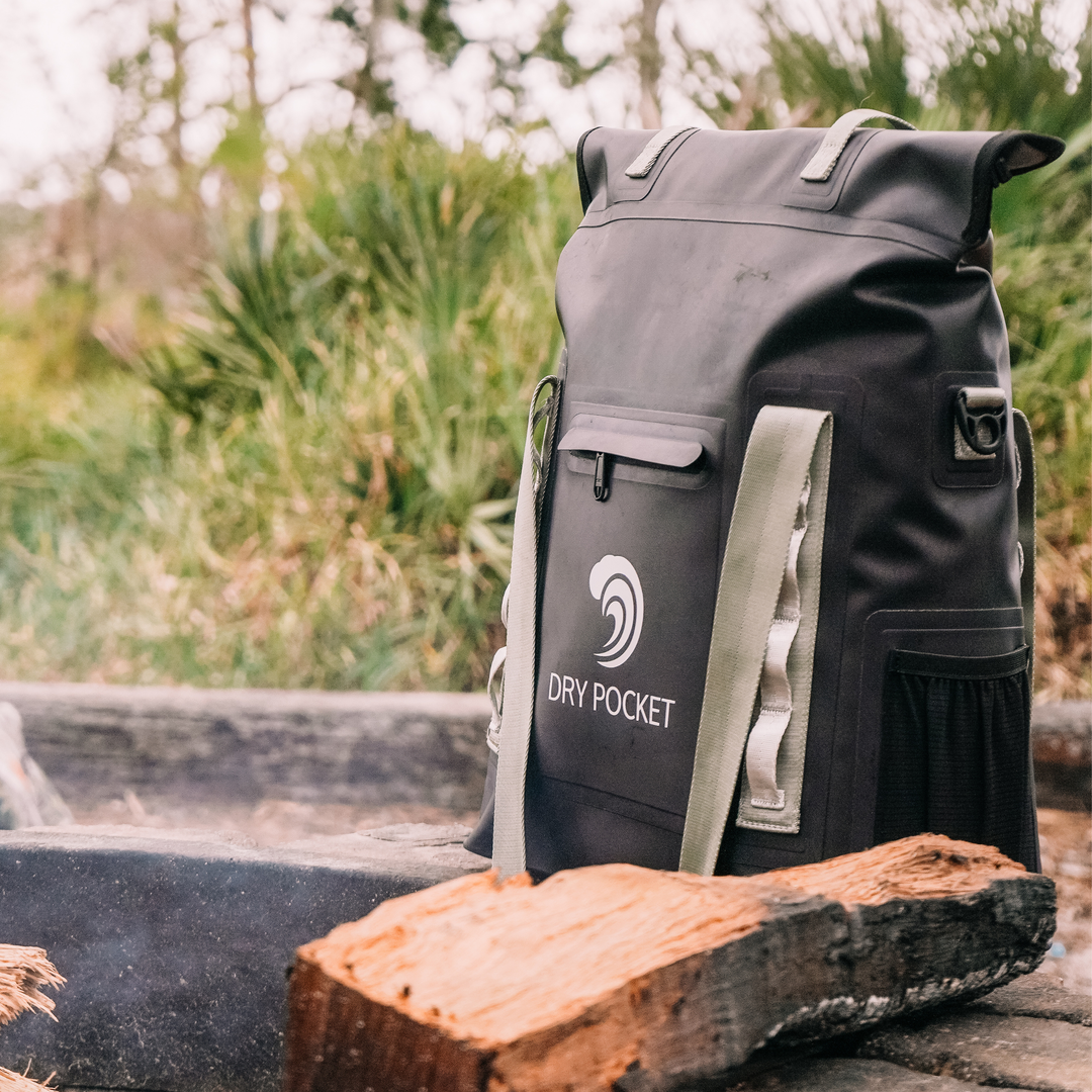 Dry Pocket black magnetic auto-sealing, waterproof, scent proof, and floating 16 can tote cooler that can also act as a dry bag. 