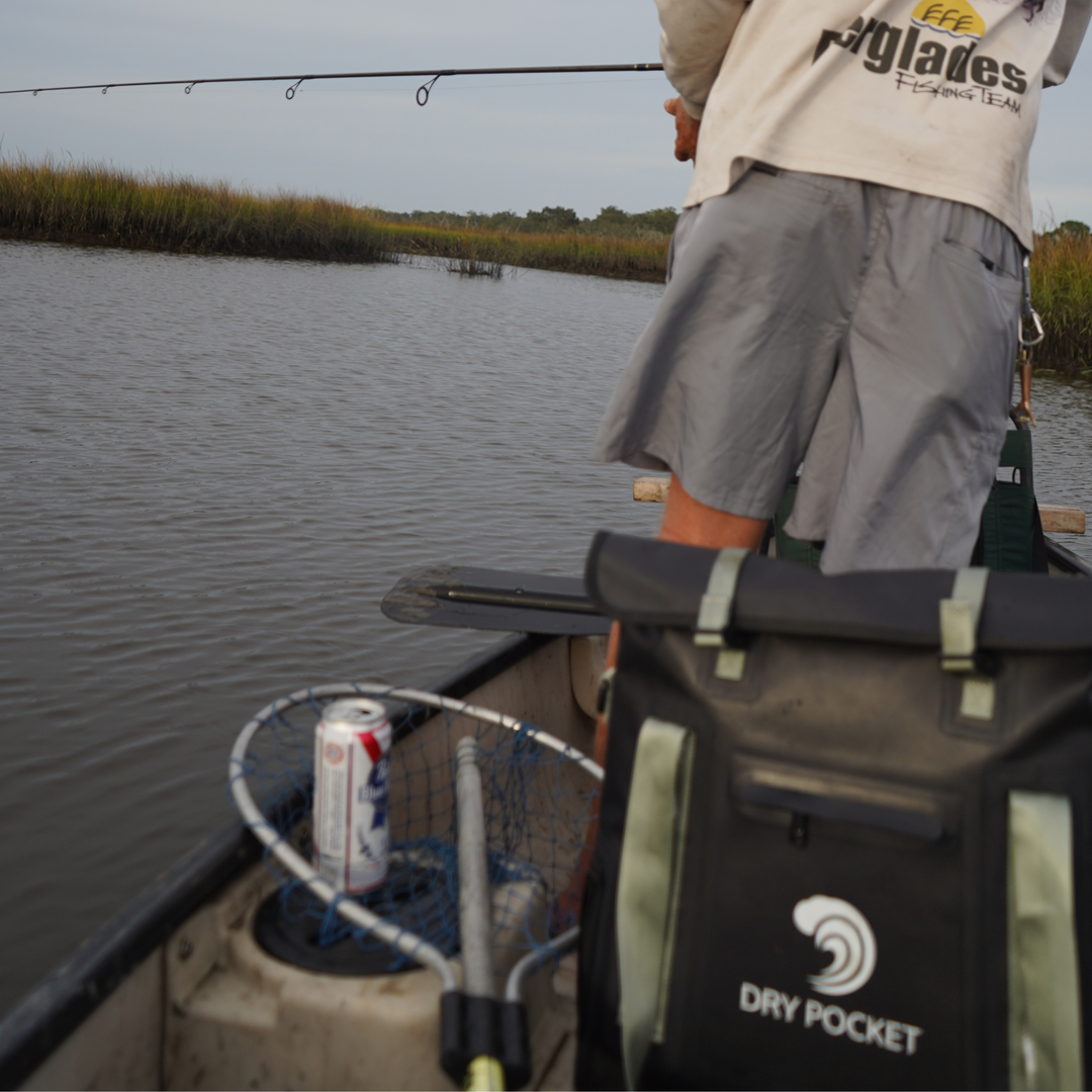 Dry Pocket black magnetic auto-sealing, waterproof, scent proof, and floating 16 can tote cooler that can also act as a dry bag. 