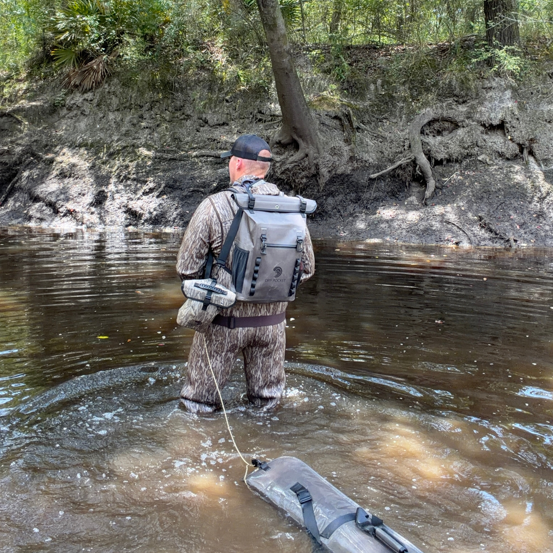 Dry Pocket auto-sealing, waterproof, scent proof, and floating olive night backpack dry bag for hunting and fishing 
