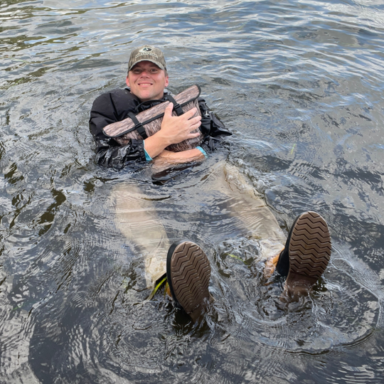 Dry Pocket desert sage magnetic auto-sealing, waterproof, scent proof, and floating 10 can tote cooler that can also act as a dry bag. 