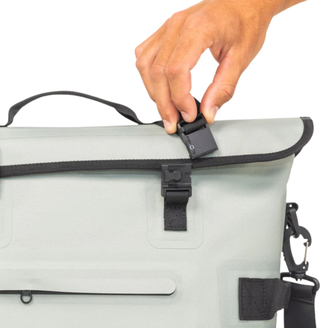 Dry Pocket desert sage magnetic auto-sealing, waterproof, scent proof, and floating 10 can tote cooler that can also act as a dry bag. 