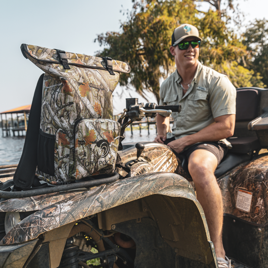 Dry Pocket waterproof, scent proof, and floating forest camo backpack dry bag