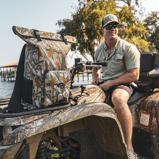 Dry Pocket waterproof, scent proof, and floating forest camo backpack dry bag