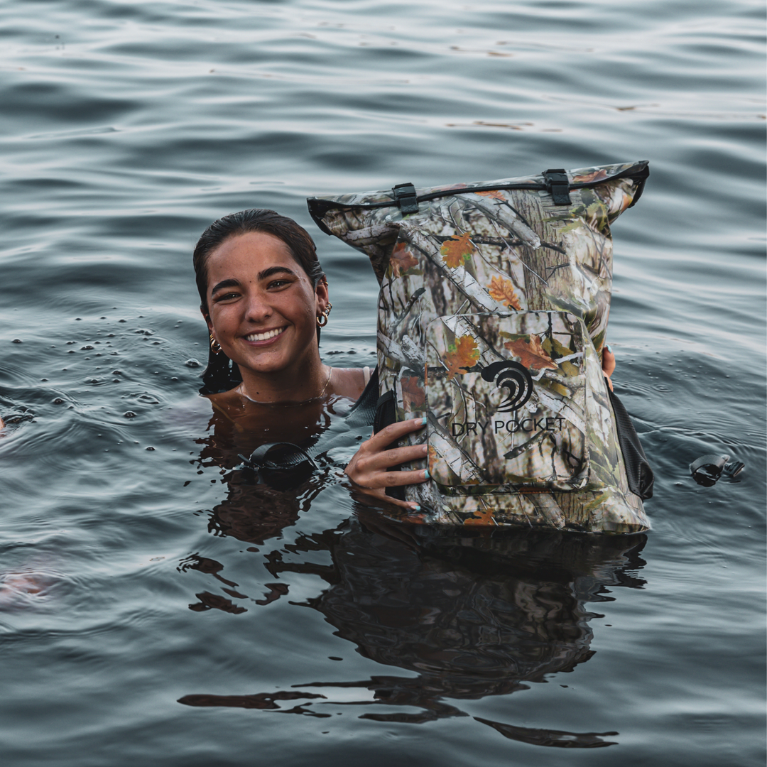 Dry Pocket waterproof, scent proof, and floating forest camo backpack dry bag