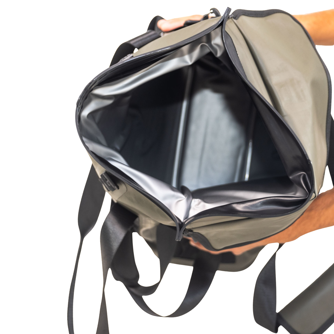 Dry Pocket hunter green magnetic auto-sealing, waterproof, scent proof, and floating 18 can tote cooler that can also act as a dry bag. 