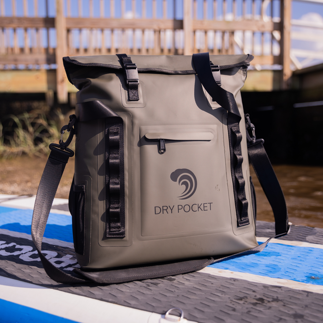 Dry Pocket hunter green magnetic auto-sealing, waterproof, scent proof, and floating 18 can tote cooler that can also act as a dry bag. 