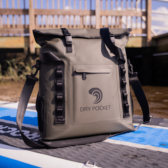 Dry Pocket hunter green magnetic auto-sealing, waterproof, scent proof, and floating 18 can tote cooler that can also act as a dry bag. 
