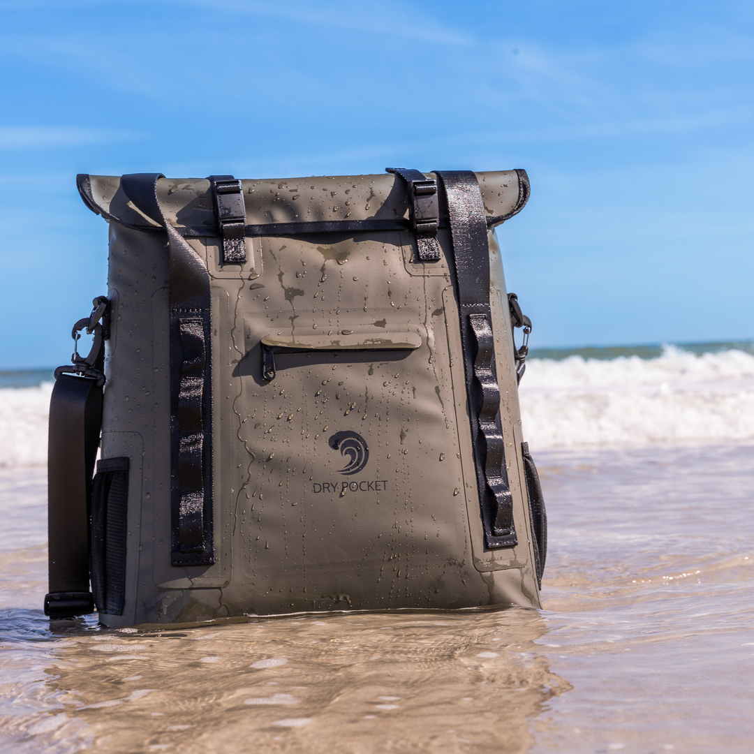 Dry Pocket hunter green magnetic auto-sealing, waterproof, scent proof, and floating 18 can tote cooler that can also act as a dry bag. 