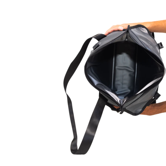 Dry Pocket grey magnetic auto-sealing, waterproof, scent proof, and floating 16 can tote cooler that can also act as a dry bag. 