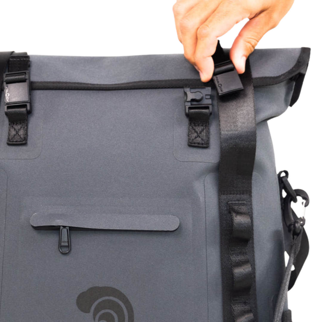 Dry Pocket grey magnetic auto-sealing, waterproof, scent proof, and floating 16 can tote cooler that can also act as a dry bag. 