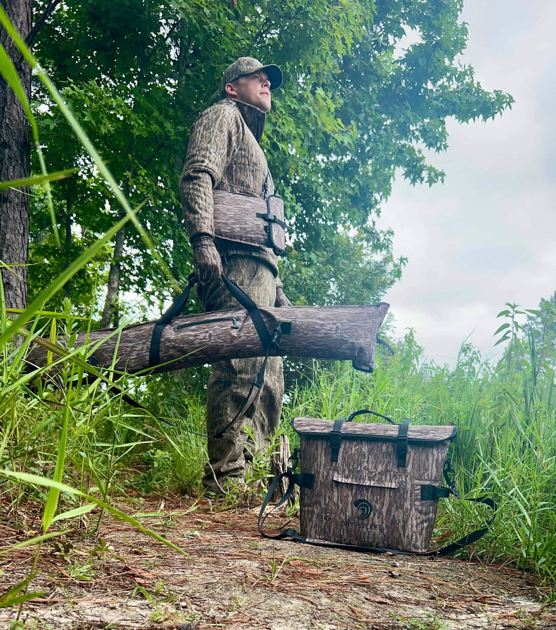 Dry Pocket has produced the world's 1st and only magnetic double lock auto-sealing, waterproof, floating shotgun dry bag for duck hunting or recreational use. / Dry Pocket, Dry Pocket Apparel, Mossy Oak, Mossy Oak New Bottomland Camo, Shotgun bag, Shotgun case, Waterproof shotgun bag, floating shotgun bag, duck hunting, hunting