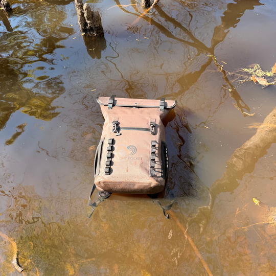 Dry Pocket auto-sealing, waterproof, scent proof, and floating olive night backpack dry bag for hunting and fishing 