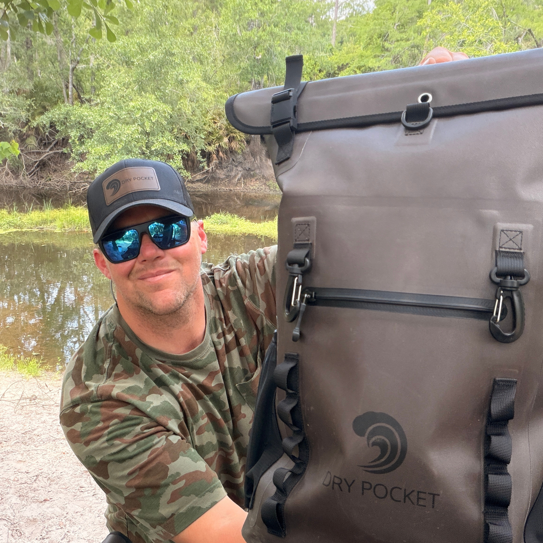 Dry Pocket auto-sealing, waterproof, scent proof, and floating olive night backpack dry bag for hunting and fishing 