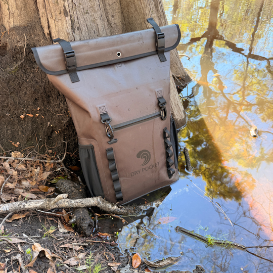 Dry Pocket auto-sealing, waterproof, scent proof, and floating olive night backpack dry bag for hunting and fishing 