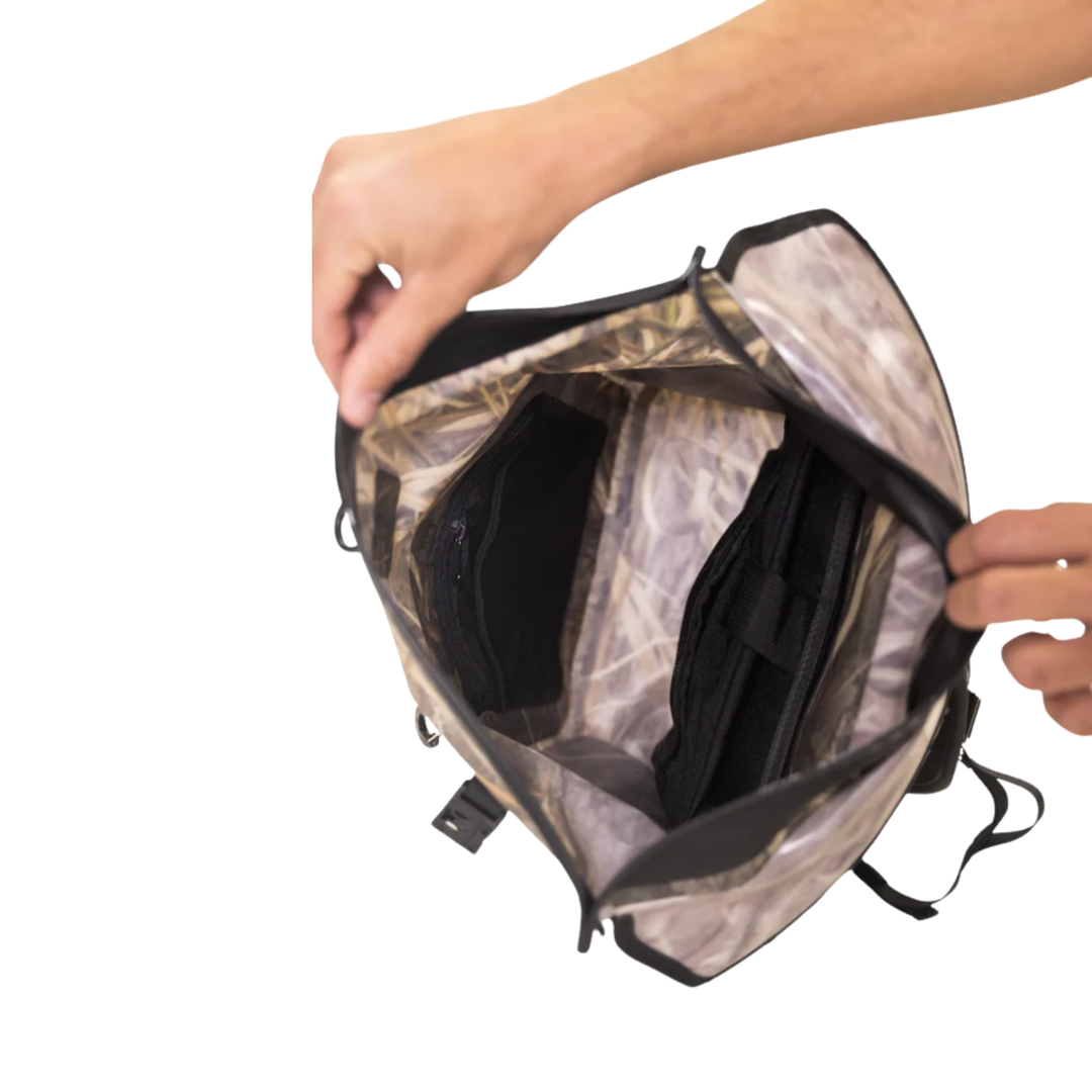 Dry Pocket waterproof, scent proof, and floating dry bag in Mossy Oak Shadow Grass Habitat camo. 