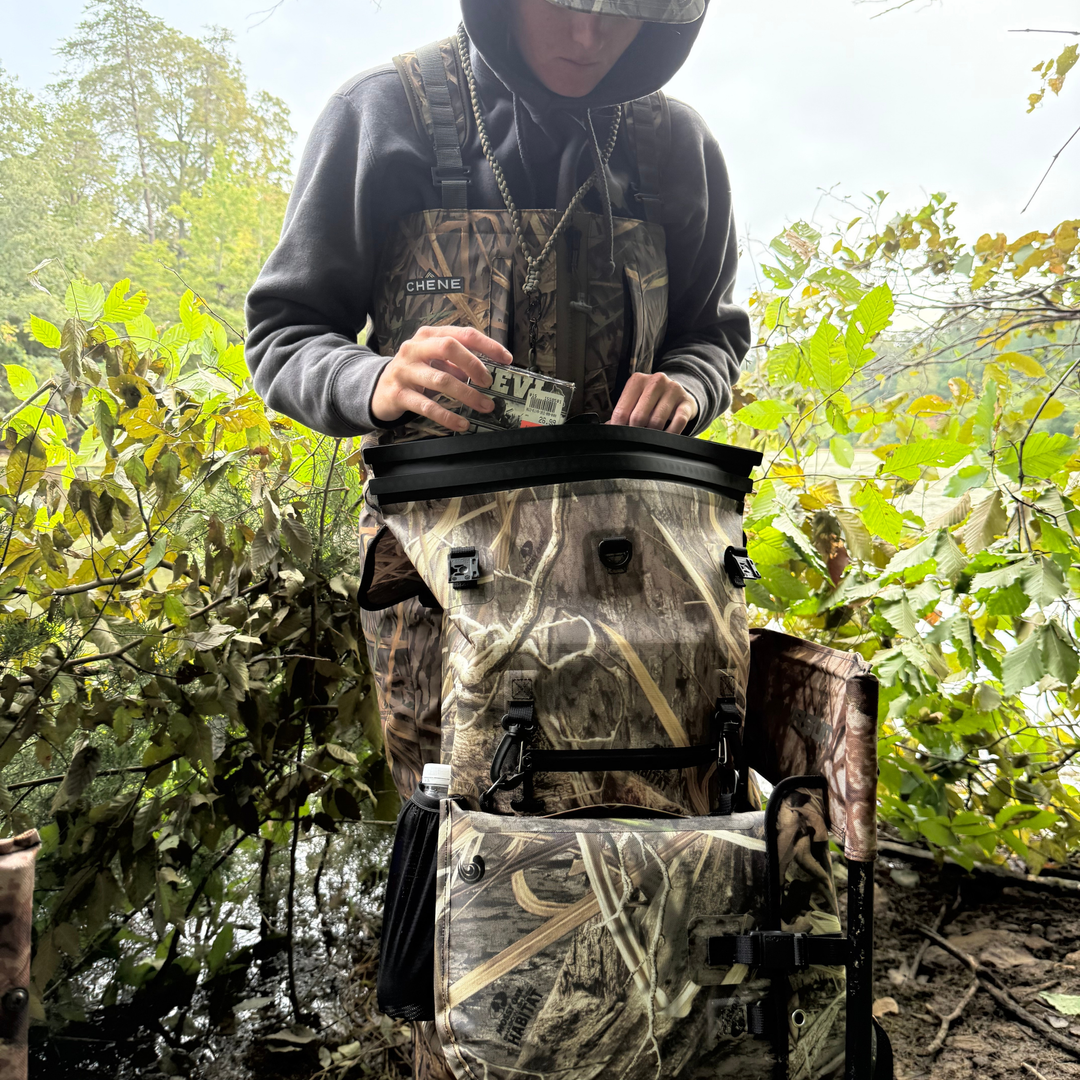 Dry Pocket waterproof, scent proof, and floating dry bag in Mossy Oak Shadow Grass Habitat camo. 