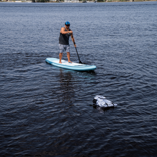 Dry Pocket waterproof, scent proof, and floating snow camo backpack dry bag
