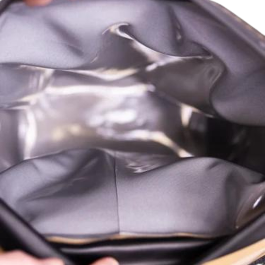 Dry Pocket magnetic auto-sealing, waterproof, scent proof, and floating backpack cooler that comes with a removable dry bag.