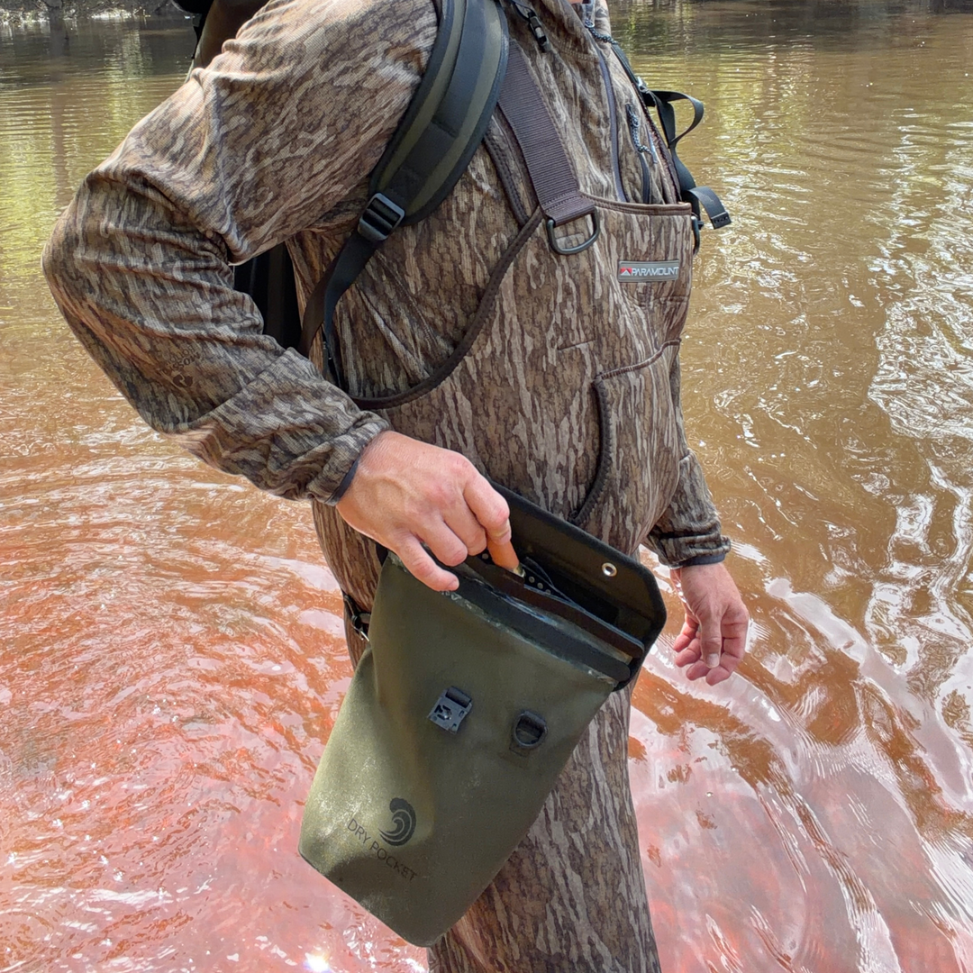 Dry Pocket magnetic double lock auto-sealing, waterproof, scent proof, and floating shell bag or dry bag. 