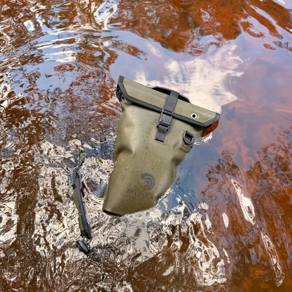 Dry Pocket magnetic double lock auto-sealing, waterproof, scent proof, and floating shell bag or dry bag. 
