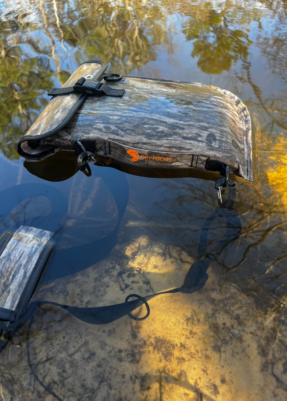 Dry Pocket, Dry Pocket Apparel, Mossy Oak, Gun Bag, Pistol Bag, Dry Bag, Waterproof Bag, Gun Case, Pistol Case, Ammo Bag, Tackle Bag, Wading Bag, Fishing Bag, Hunting Bag, Hiking Bag, Camping Bag, Boating Bag, Floating Pistol Bag, Floating gun Bag, Waterproof Wading Bag, Waterproof Ammo Bag,