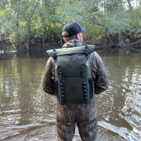 Dry Pocket auto-sealing, waterproof, scent proof, and floating olive night backpack dry bag for hunting and fishing 