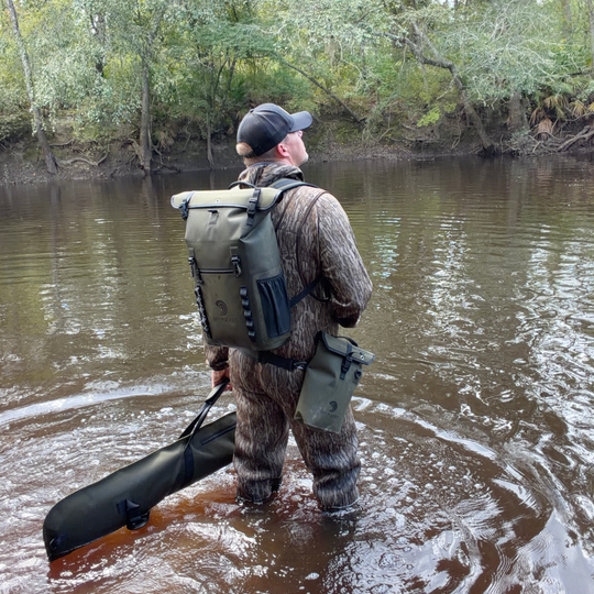 Dry Pocket auto-sealing, waterproof, scent proof, and floating olive night backpack dry bag for hunting and fishing 