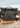 Dry Pocket Mossy Oak New Bottomland Camouflage-patterned bag with a brand logo on a wet surface