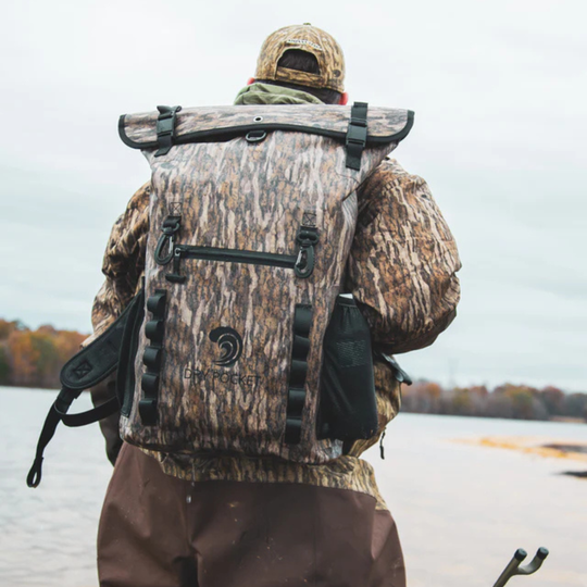 Dry Pocket waterproof, scent proof, and floating backpack dry bag or blind bag with Mossy Oak Bottomland camo. 