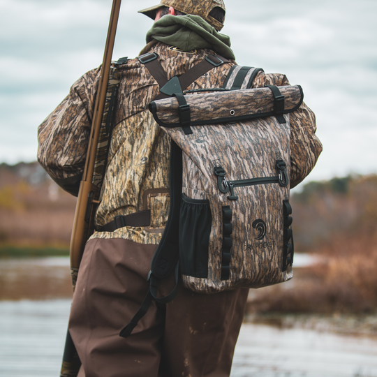 Dry Pocket waterproof, scent proof, and floating backpack dry bag or blind bag with Mossy Oak Bottomland camo. 