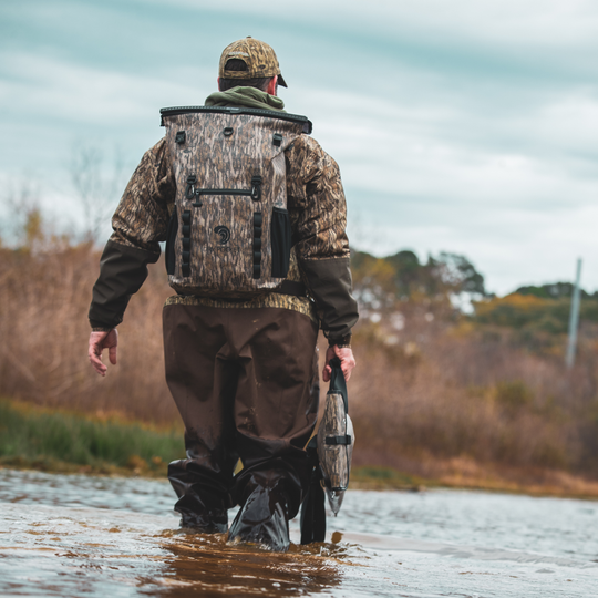 Dry Pocket waterproof, scent proof, and floating backpack dry bag or blind bag with Mossy Oak Bottomland camo. 