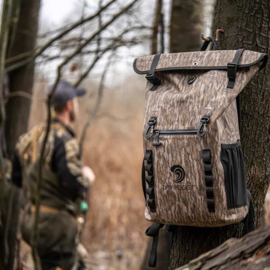 Dry Pocket waterproof, scent proof, and floating backpack dry bag or blind bag with Mossy Oak Bottomland camo. 