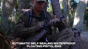 Dry Pocket, Dry Pocket Apparel, Mossy Oak, Gun Bag, Pistol Bag, Dry Bag, Waterproof Bag, Gun Case, Pistol Case, Ammo Bag, Tackle Bag, Wading Bag, Fishing Bag, Hunting Bag, Hiking Bag, Camping Bag, Boating Bag, Floating Pistol Bag, Floating gun Bag, Waterproof Wading Bag, Waterproof Ammo Bag,