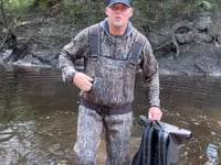 Dry Pocket auto-sealing, waterproof, scent proof, and floating olive night backpack dry bag for hunting and fishing 