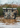 Dry Pocket Camouflage cooler bag in a natural setting with water and grass.