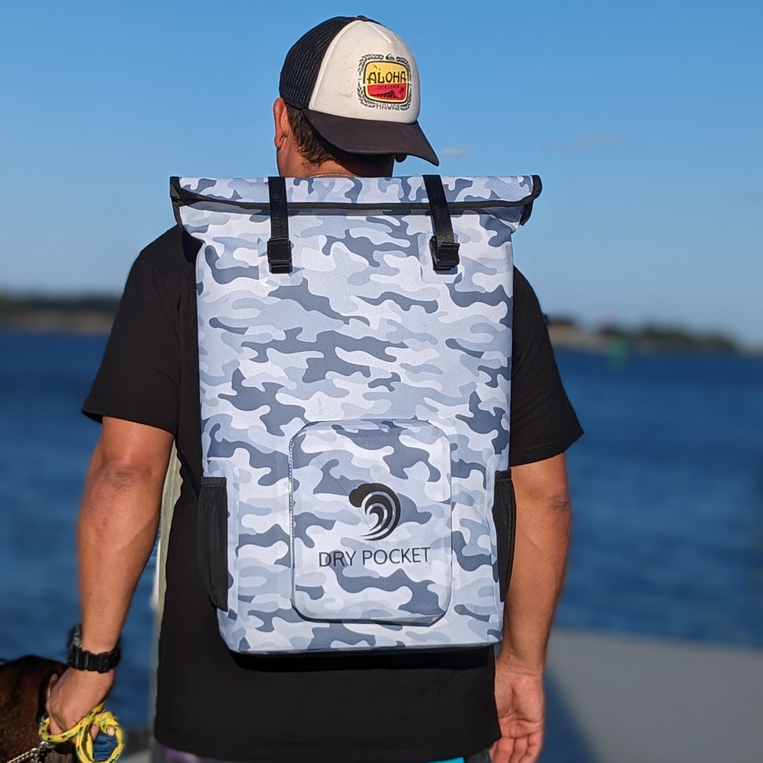 Dry Pocket snow camo magnetic auto-sealing, waterproof, scent proof, and floating backpack cooler that can also act as a waterproof dry bag. 